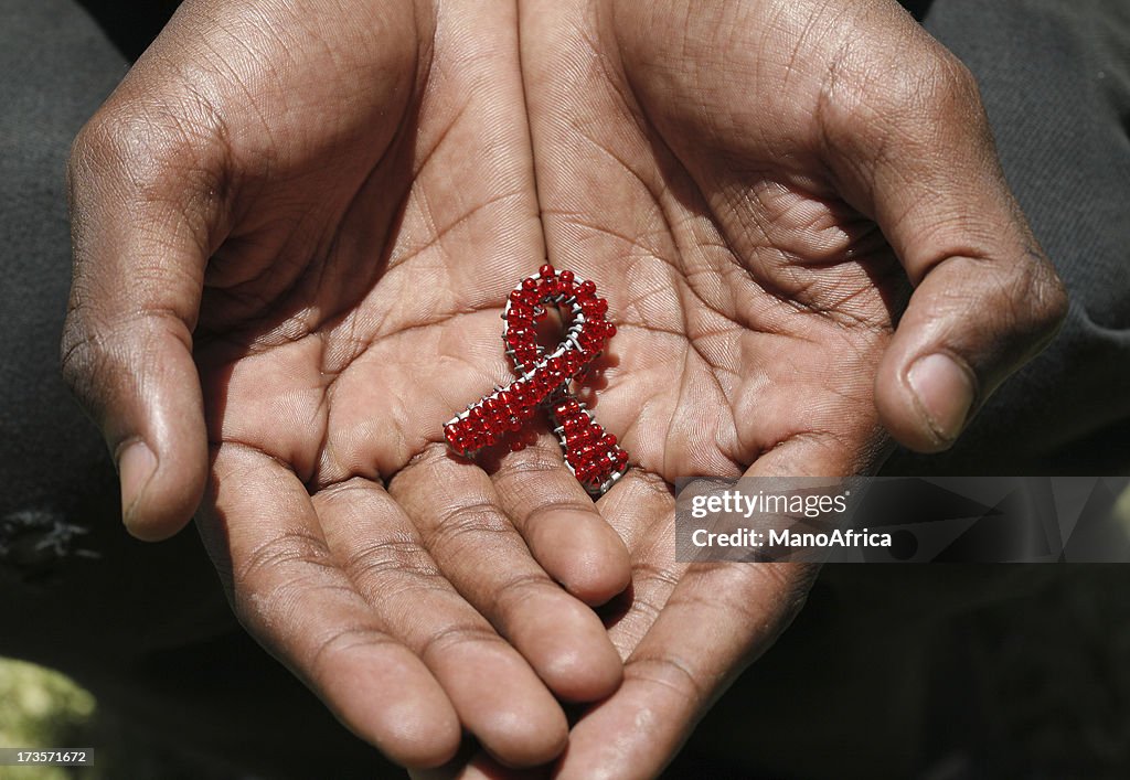 Beaded AIDS in hands