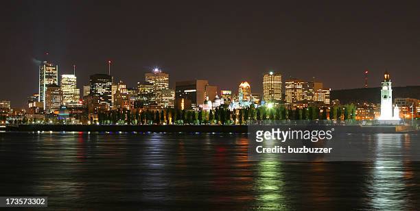 illuminated montreal city at night - montreal clock tower stock pictures, royalty-free photos & images