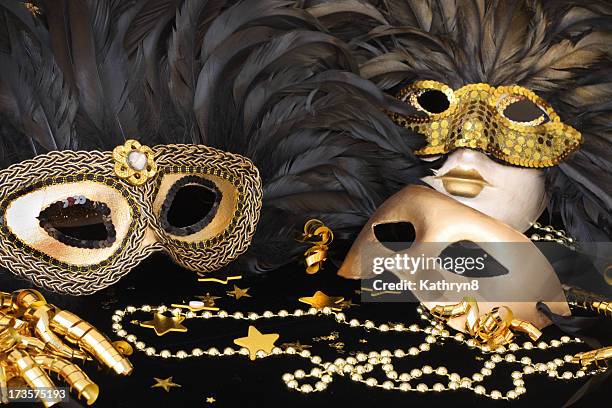 set of golden mardi grass masks with feathers - mardi gras background stock pictures, royalty-free photos & images