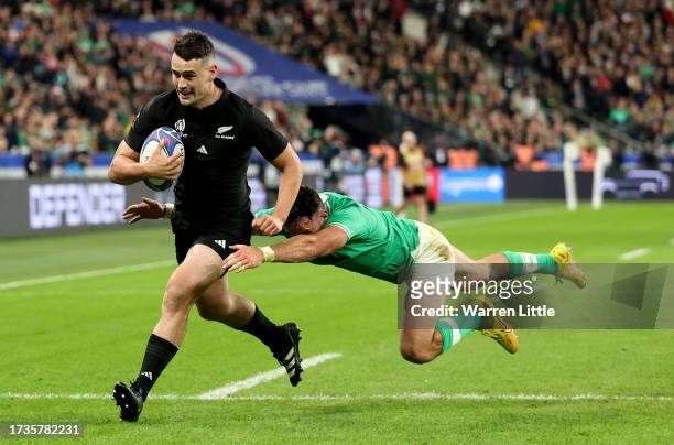 Will Jordan of New Zealand scores his team's third try during the Rugby World Cup France 2023 Quarter Final match between Ireland and New Zealand at...