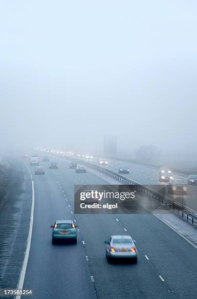 m56 motorway fog - motorway uk stock pictures, royalty-free photos & images