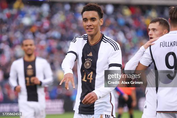 Jamal Musiala of German celebrates after scoring the team's third goal during the international friendly match between Germany and United States at...