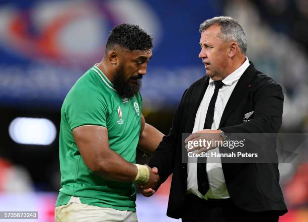 Ian Foster, Head Coach of New Zealand, consoles Bundee Aki of Ireland at full-time following the Rugby World Cup France 2023 Quarter Final match...