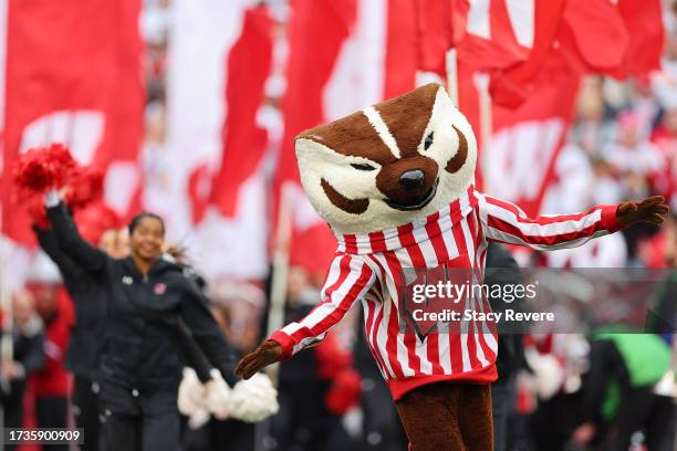 Wisconsin Badgers mascot Bucky Badger leads the team onto the field prior to a game between the Wisconsin Badgers and the Iowa Hawkeyes at Camp...
