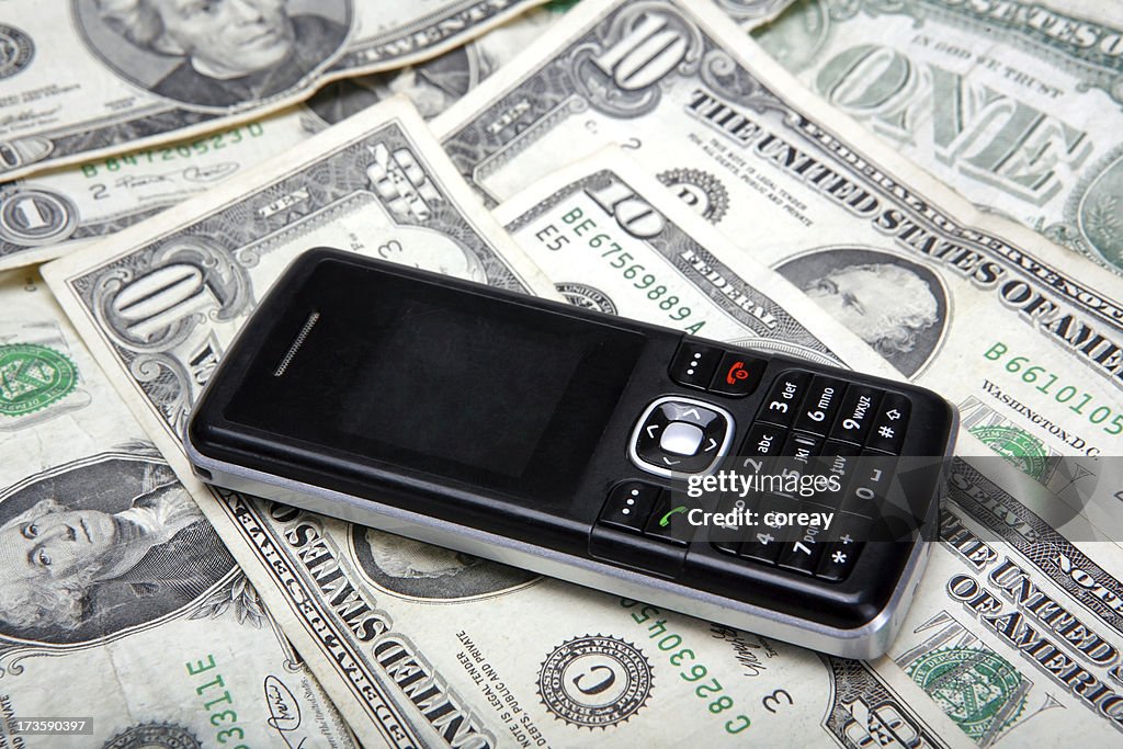 Teléfono móvil y dólares