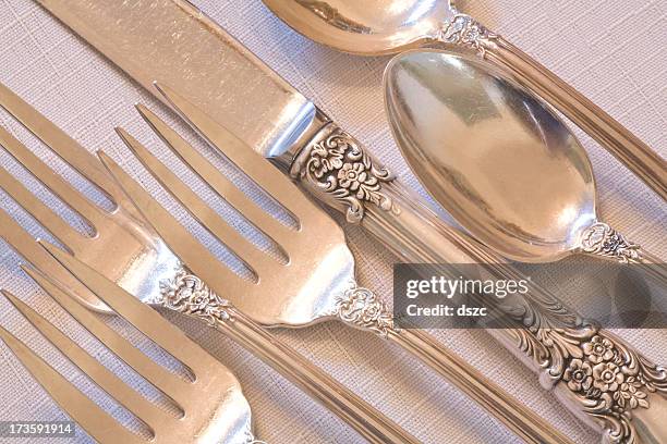 fine dining elegant antique silverware place setting - eetgerei stockfoto's en -beelden