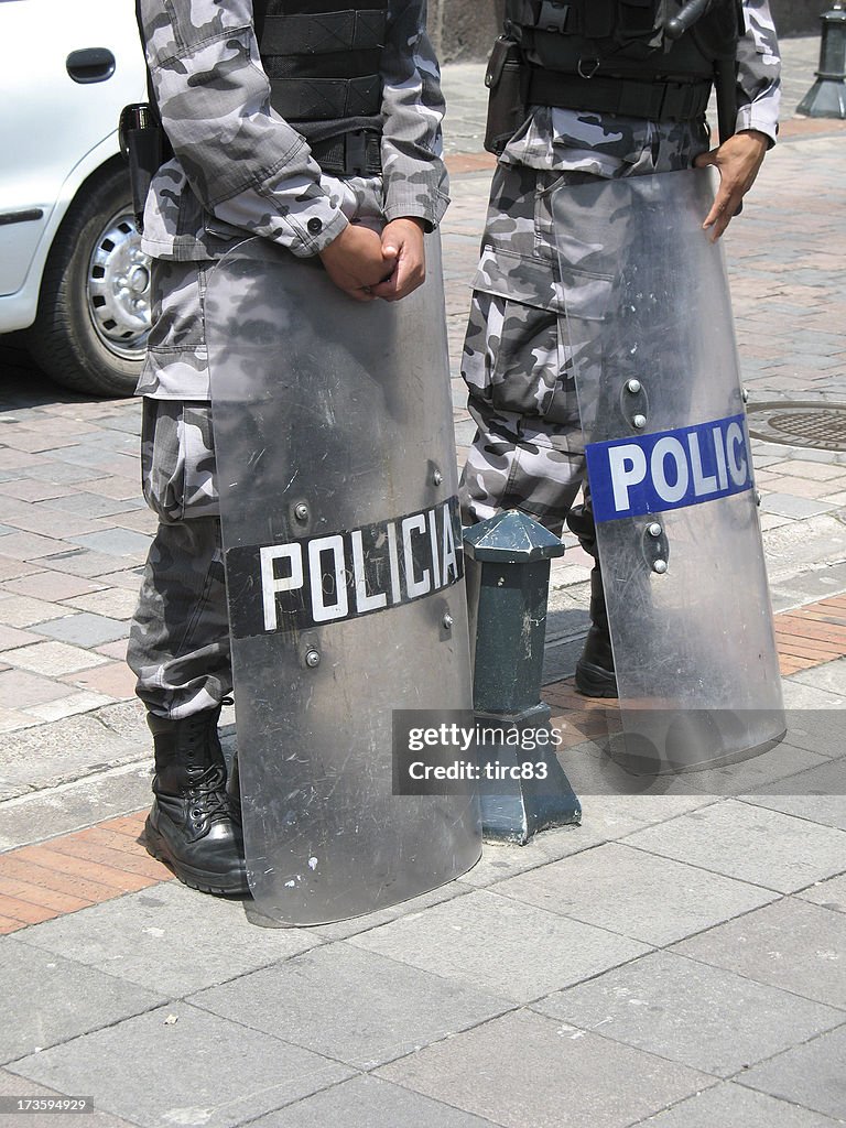 Two South American riot police