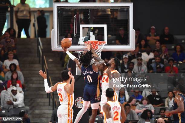 Dereon Seabron of the New Orleans Pelicans drives to the basket against the Atlanta Hawks in a preseason game at Gateway Center Arena on October 14,...