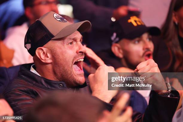 Tyson Fury reacts during the Misfits Cruiserweight fight between KSI and Tommy Fury at AO Arena on October 14, 2023 in Manchester, England.