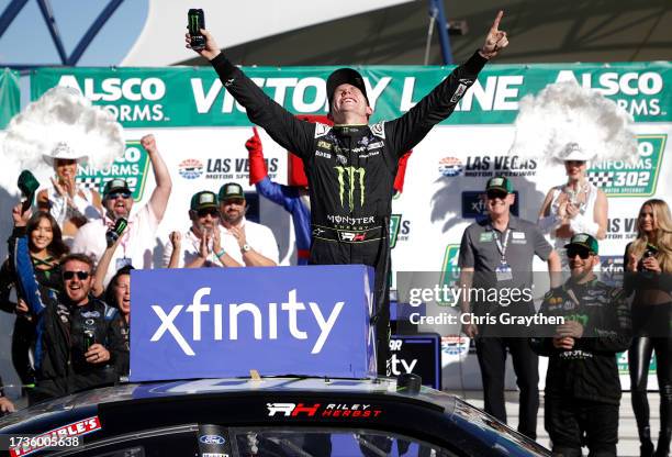 Riley Herbst, driver of the Monster Energy Ford, celebrates in victory lane after winning the NASCAR Xfinity Series Alsco Uniforms 302 at Las Vegas...