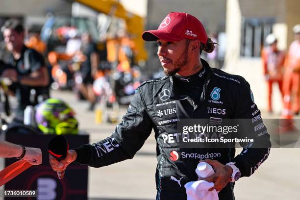 Mercedes AMG Petronas F1 Team driver Lewis Hamilton of the United Kingdom prepares to interview after qualifying P3 following the qualifying session...