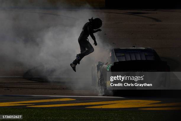 Riley Herbst, driver of the Monster Energy Ford, celebrates after winning the NASCAR Xfinity Series Alsco Uniforms 302 at Las Vegas Motor Speedway on...
