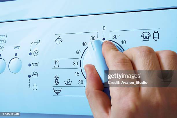 washing machine and hand - hand wasser stockfoto's en -beelden