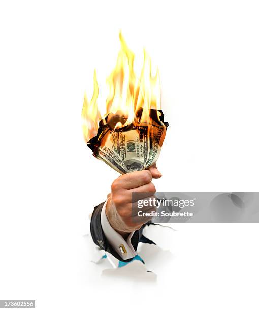 money to burn - money to burn stock pictures, royalty-free photos & images