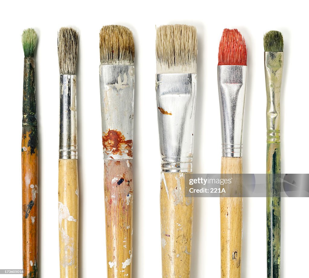 Six paintbrushes on white