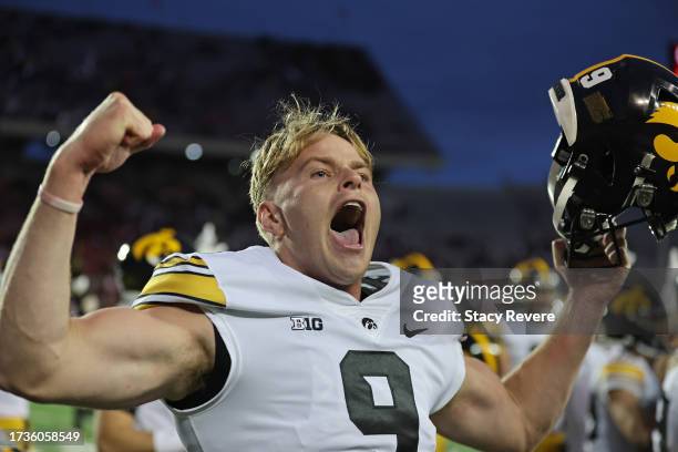 Tory Taylor of the Iowa Hawkeyes celebrates after the Hawkeyes defeated the Wisconsin Badgers at Camp Randall Stadium on October 14, 2023 in Madison,...