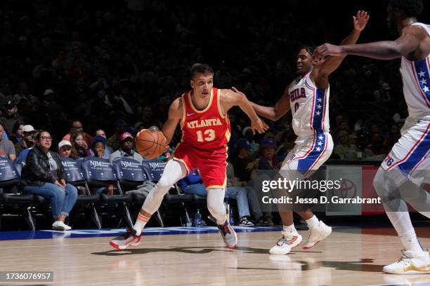 Bogdan Bogdanovic of the Atlanta Hawks dribbles the ball during the game against the Philadelphia 76ers on October 20, 2023 at the Wells Fargo Center...