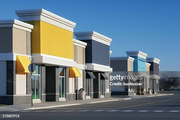 colorful store building exteriors - building exterior stock pictures, royalty-free photos & images