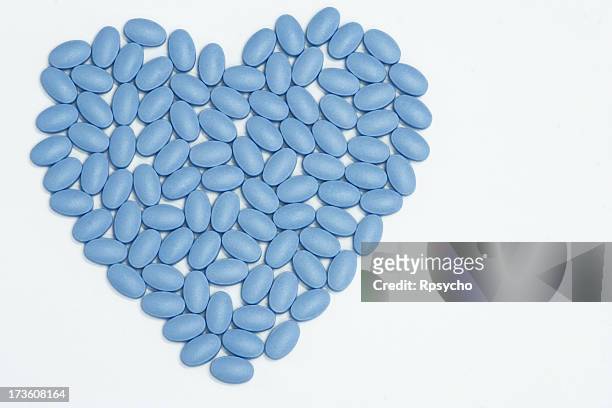 blue pills of love - viagra stock pictures, royalty-free photos & images