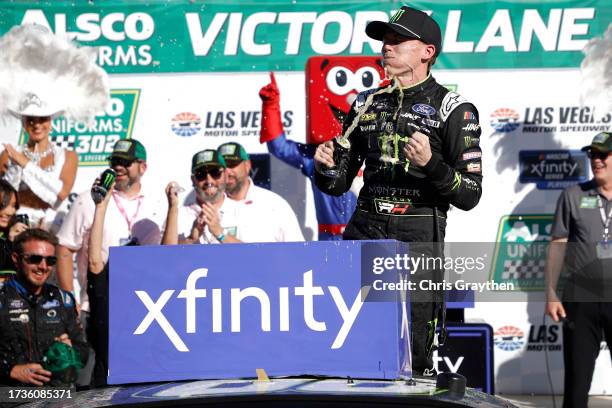 Riley Herbst, driver of the Monster Energy Ford, celebrates in victory lane after winning the NASCAR Xfinity Series Alsco Uniforms 302 at Las Vegas...