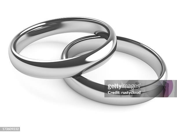 two rings - platinum or silver - platinum rings stock pictures, royalty-free photos & images