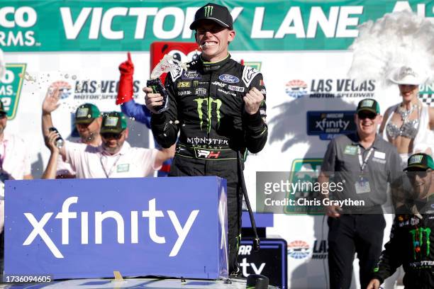 Riley Herbst, driver of the Monster Energy Ford, celebrates in victory lane after winning the NASCAR Xfinity Series Alsco Uniforms 302 at Las Vegas...