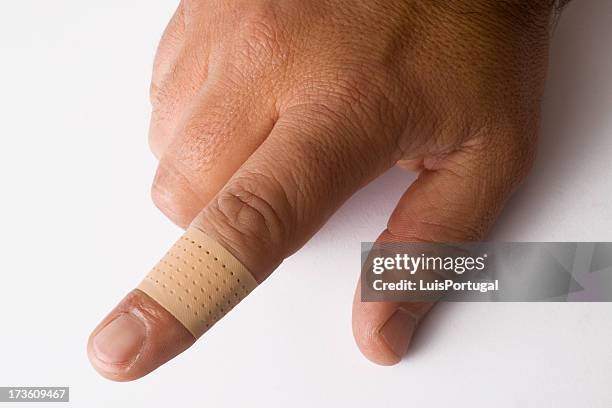 first aid - bandaged thumb stock pictures, royalty-free photos & images