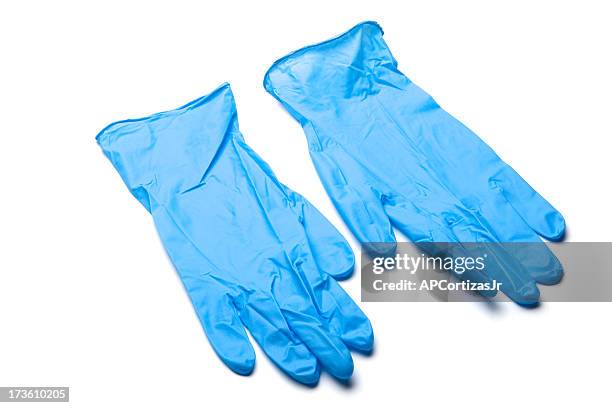 azul par de luvas cirúrgicas em fundo branco - látex borracha imagens e fotografias de stock