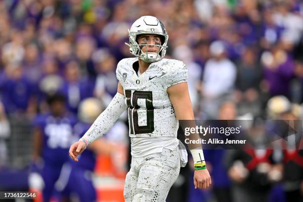 Bo Nix of the Oregon Ducks looks on during the third quarter against the Washington Huskies at Husky Stadium on October 14, 2023 in Seattle,...