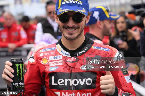 Ducati Lenovo Team's Italian rider Francesco Bagnaia celebrates his pole position after the qualifying session of the MotoGP Australian Grand Prix at...