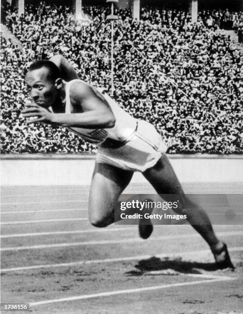 Jesse Owens of the USA in action in the mens 200m at the 1936 Summer Olympic Games held in Berlin, Germany. Owens won a total of four gold medals in...