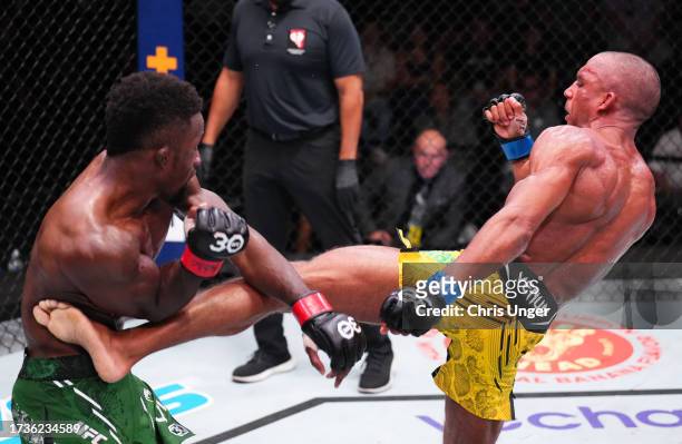 Edson Barboza of Brazil kicks Sodiq Yusuff of Nigeria in a featherweight fight during the UFC Fight Night event at UFC APEX on October 14, 2023 in...