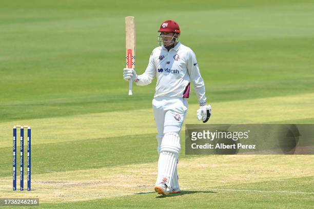 Matthew Renshaw of Queensland celebrates his half century during the Sheffield Shield match between Queensland and Victoria at Great Barrier Reef...