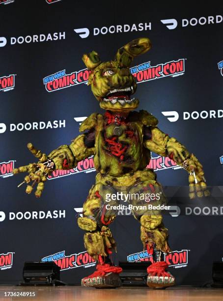 Cosplayer dressed as Springtrap from Five Nights At Freddies 3 poses during Cosplay Central Crown Championship Qualifier at New York Comic Con 2023 -...