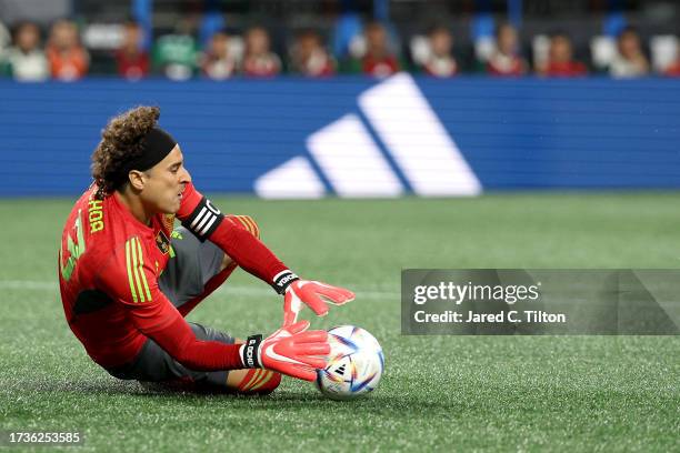Guillermo Ochoa of México makes a save during the first half of their match against Ghana at Bank of America Stadium on October 14, 2023 in...