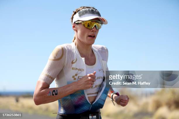 Lucy Charles-Barclay of Great Britain competes during the run portion during the VinFast IRONMAN World Championship on October 14, 2023 in Kailua...