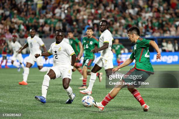 Hirving Lozano of México attempts a shot during the second half of their match against Ghana at Bank of America Stadium on October 14, 2023 in...