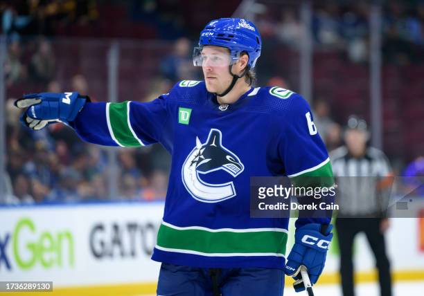Brock Boeser of the Vancouver Canucks waits for a face-off during the third period of their NHL game against the Edmonton Oilers at Rogers Arena on...