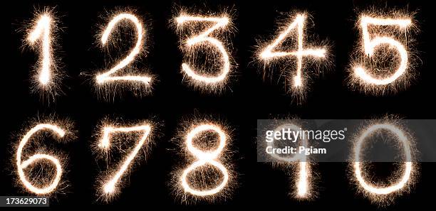 numbers written with a sparkler - number 4 stock pictures, royalty-free photos & images