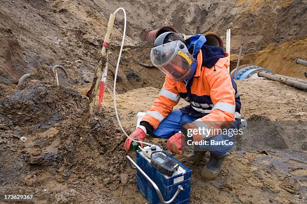 taking samples of the soil, environmental research. - asbestos stock pictures, royalty-free photos & images