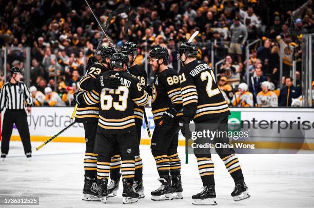 James van Riemsdyk of the Boston Bruins celebrates his third period goal with David Pastrnak, Brad Marchand, Charlie McAvoy, and Pavel Zacha against...