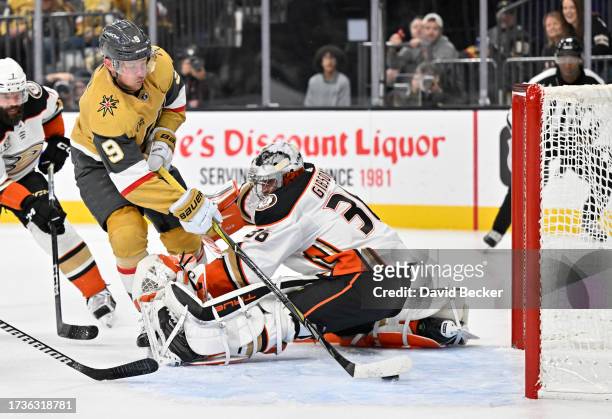 Jack Eichel of the Vegas Golden Knights scores a goal against John Gibson of the Anaheim Ducks during the first period at T-Mobile Arena on October...