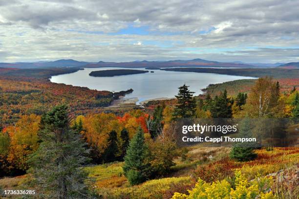 lake mooselookmeguntic maine during autumn near rangeley, maine usa - mooselookmeguntic lake fotografías e imágenes de stock