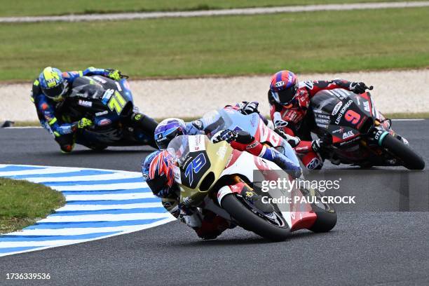 Idemitsu Honda Team Asia's Japanese rider Ai Ogura leads the pack during the Moto2 class qualifying session of the MotoGP Australian Grand Prix at...