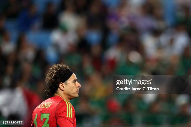 Guillermo Ochoa of México looks on during the first half of their match against Ghana at Bank of America Stadium on October 14, 2023 in Charlotte,...