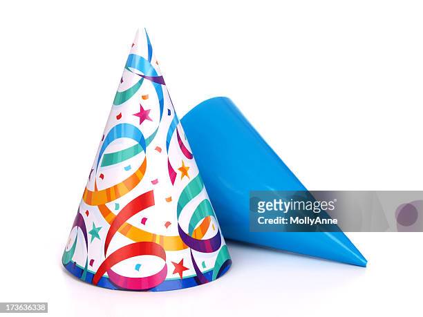 two birthday party hats one blue and the other multicolored - hat stock pictures, royalty-free photos & images
