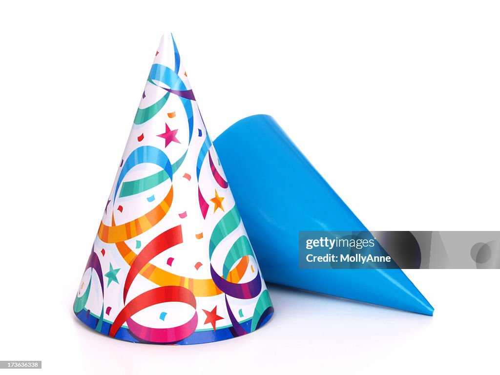 Two birthday party hats one blue and the other multicolored