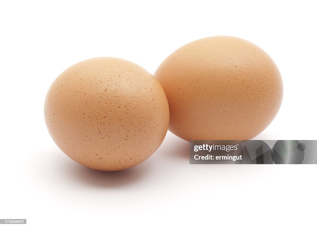 Two eggs isolated on white.