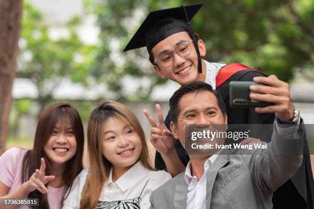 university graduation venue - chinese people graduation stock pictures, royalty-free photos & images