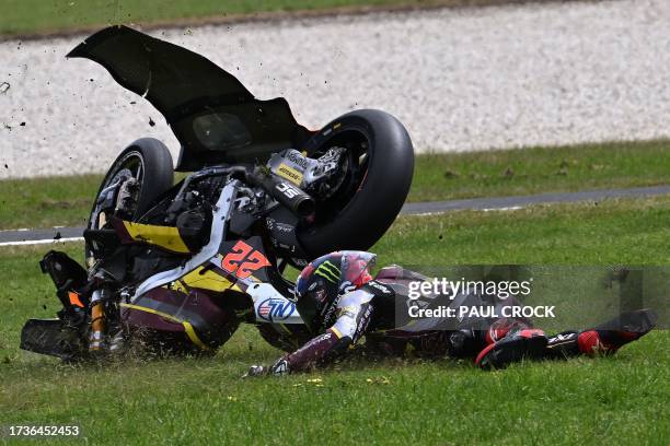 Elf Marc VDS Rasing Team's British rider Sam Lowes slides off the track during the Moto2 class qualifying session of the MotoGP Australian Grand Prix...